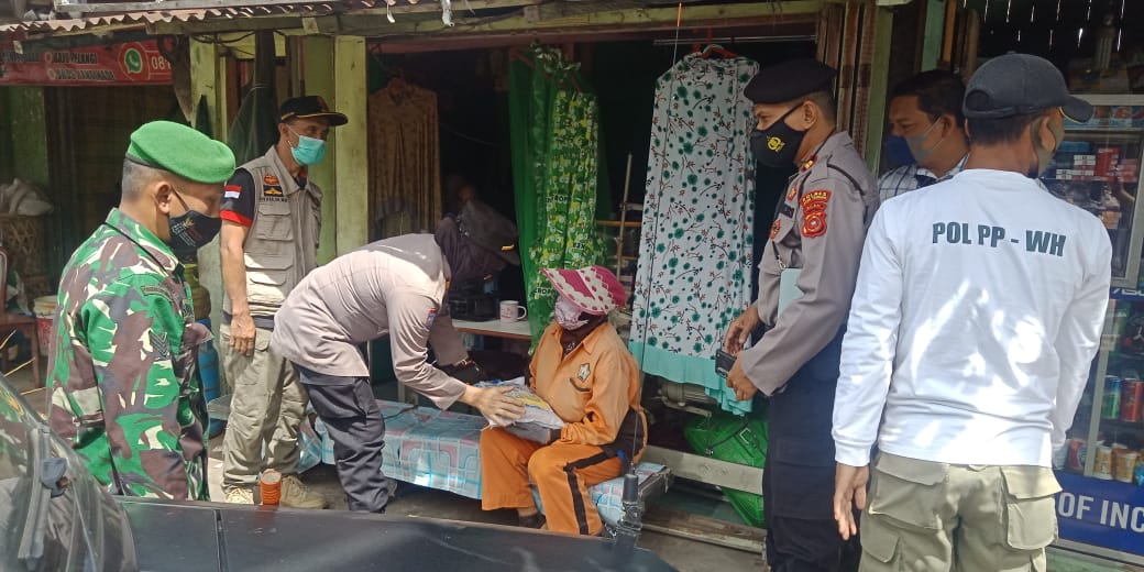 Polisi Aceh Salurkan 2.000 Paket Sembako Perhari Bagi Warga Terdampak PPKM Level IV