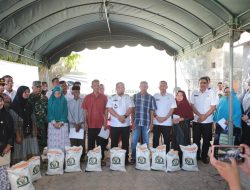 Pj Bupati Aceh Besar Lauching Penyaluran Bantuan Pangan Candangan Beras Tahap I 2024