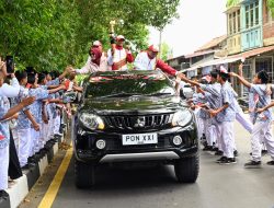 Ribuan Pelajar dan Masyarakat Aceh Besar Antusias Sambut Kirab Api PON XXI Aceh-Sumut