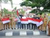 Pemkab Aceh Barat Bagikan 2.225 Bendera Merah Putih kepada Masyarakat